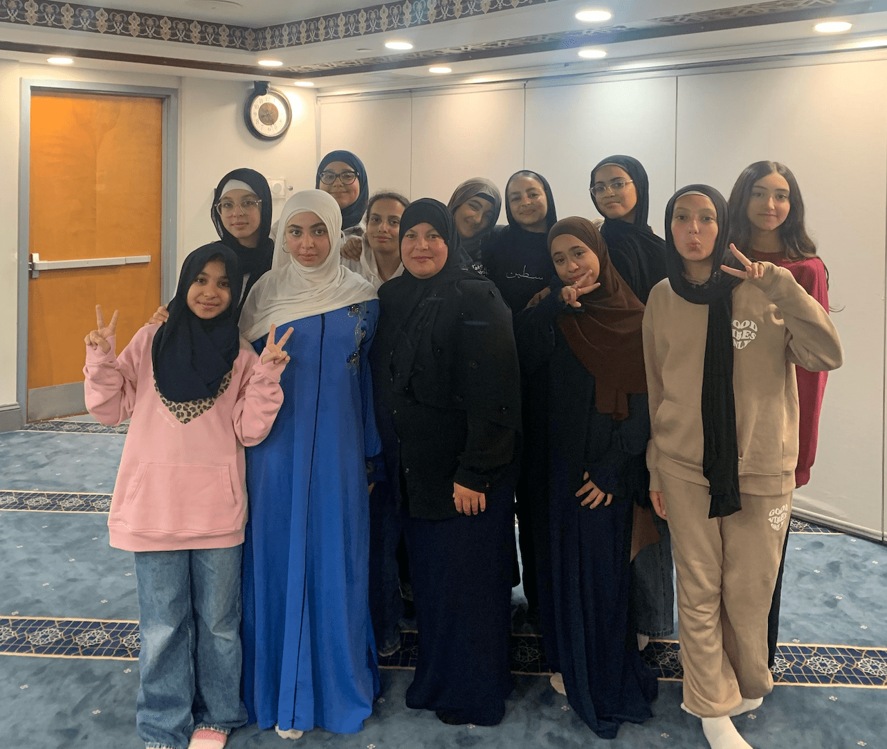 Abeer Annab meeting with students at local event