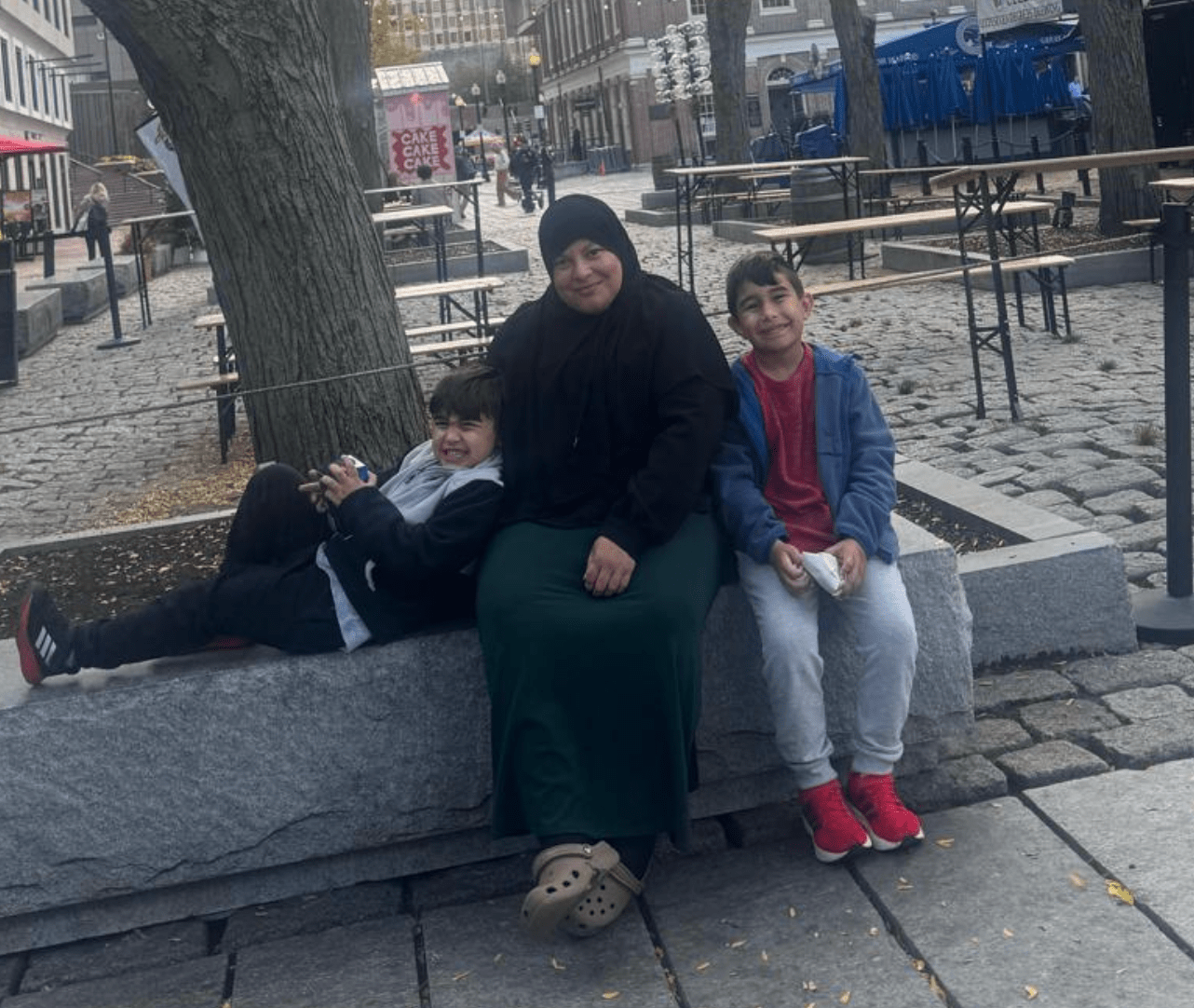 Abeer Annab spending time with students chatting about schools